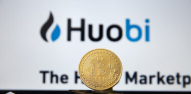 Bitcoin coin and Huobi logo
