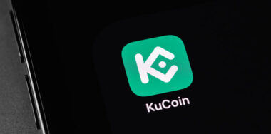 KuCoin mobile icon app on screen smartphone