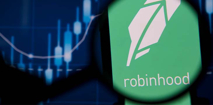 LONDON, UK - January 2021: Robinhood investing app under magnifying glass