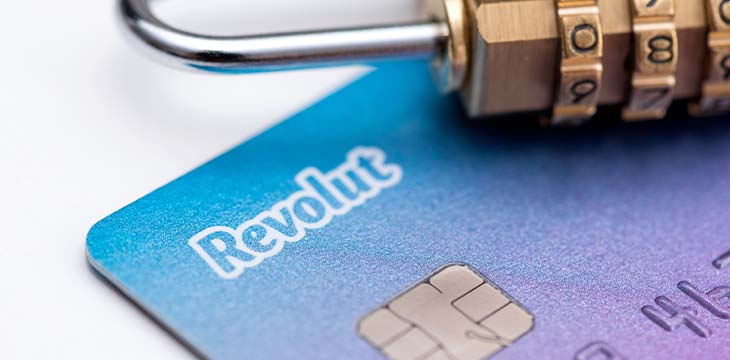 Wroclaw, Poland - MAY 20, 2020: Revolut debit card with padlock, security concept. Revolut Ltd is a UK financial technology company that offers banking services. — Photo