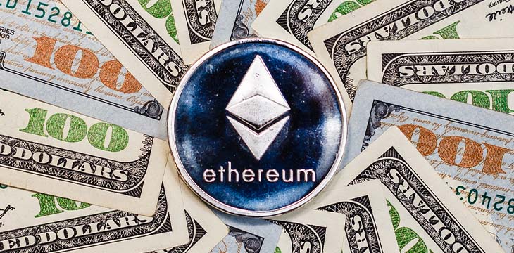 Ethereum crypto currency on dollar banknotes — Photo