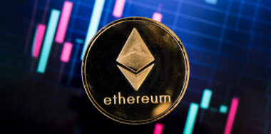 Ethereum coin with background of digital chart
