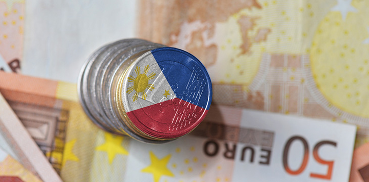 Euro coin with national flag of philippines on the top most coin