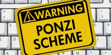 Ponzi Scheme Sign over keyboard