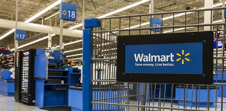 Walmart logo on a shopping cart.