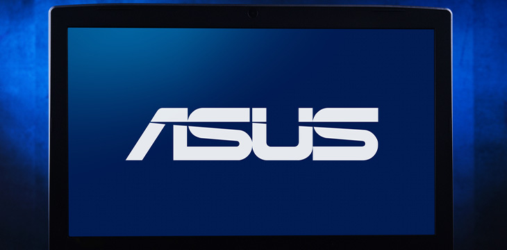 Laptop computer displaying logo of Asus