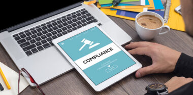 COMPLIANCE CONCEPT on tablet screen