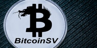 Coin cryptocurrency BSV on a grey background