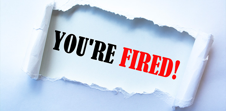 Text sign showing YOU'RE FIRED