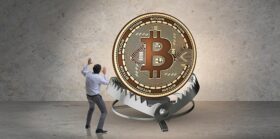 Businessman falling into the trap of bitcoin crypto