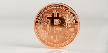 Coin with Bitcoin logo
