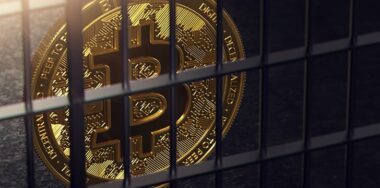 Bitcoin behind bars concept