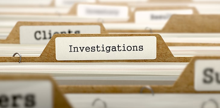 Investigations Concept with Word on Folder