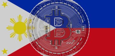 bitcoin in front of the Philippine flag