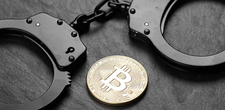bitcoin and handcuffs