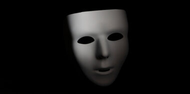 A blank, emotionless masquerade mask