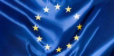 Close up of blue european union flag with yellow stars