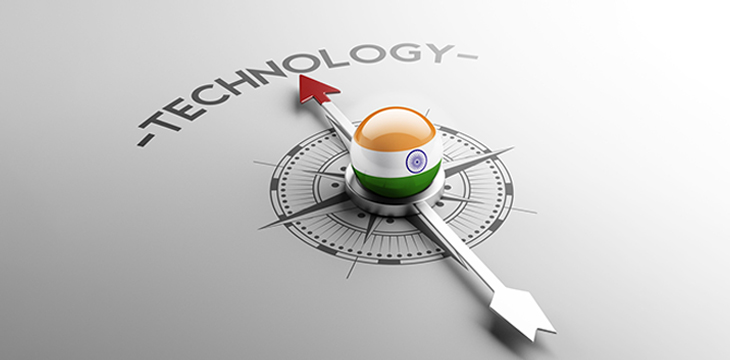 ndia Technology Concept compass arrow with Indian flag in the middle pointing to technology word