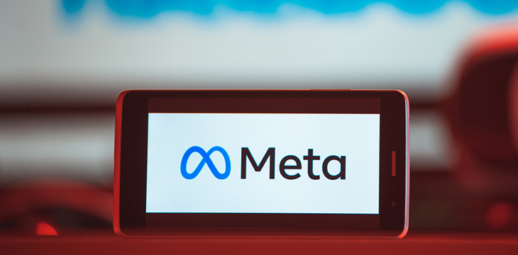 meta logo on a phone