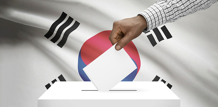 Ballot box with South Korean flag on background