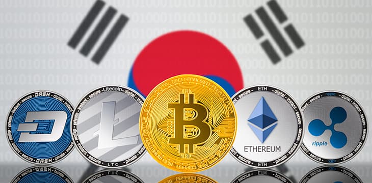 Cryptocurrency coins - Bitcoin (BTC), Litecoin (LTC), Ethereum (ETH), Ripple (XRP), DASH on the background of the flag of South Korea (ROK).