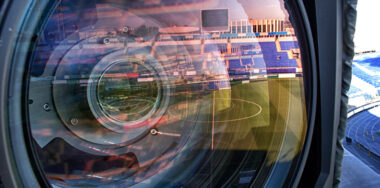 Reflection of football field on camera lens