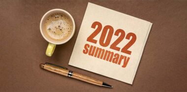2022 year summary text on a napkin with a cup of coffee, end of year business concept — Photo