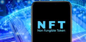 Smartphone with the acronym NFT logo
