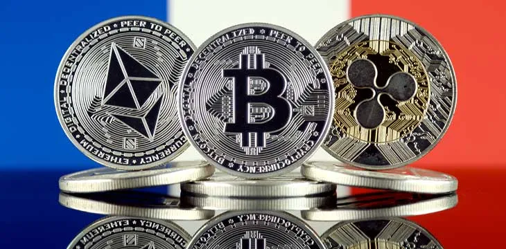 Physical version of Ethereum (ETH), Bitcoin (BTC), Ripple (XRP) and France Flag