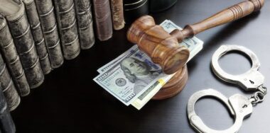 Judges Gavel, Handcuffs, Dollar Cash And Book On Black Table