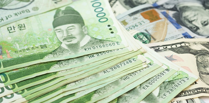 Korean won and US Dollar bills