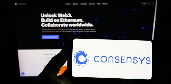 Consensys logo on smartphone screen