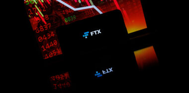 FTX logo on mobile screen, FTX Bankruptcy, Coinbase