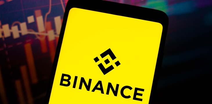 February 1, 2022, Brazil. In this photo illustration, the logo of Binance, a cryptocurrency exchange is displayed on a smartphone screen — Stock Editorial Photography