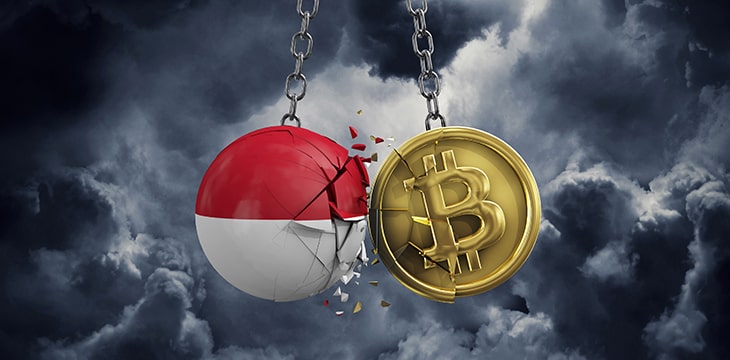 Indonesia flag smashing into a gold bitcoin crypto coin