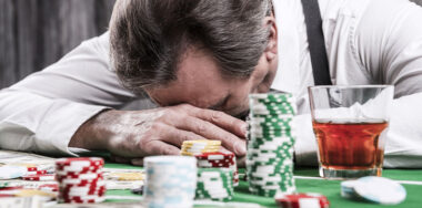 Man sleeping on poker table
