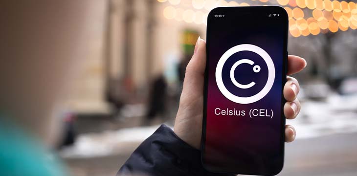 Kharkov, Ukraine - February 2, 2022: Celsius CEL coin symbol. Trade with cryptocurrency, digital and virtual money, mobile banking. Hand with smartphone, screen with crypto icon close-up — Stock Editorial Photography