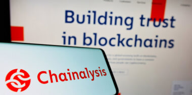 STUTTGART, GERMANY - Jun 28, 2021: Smartphone with logo of US cryptocurrency company Chainalysis Inc. on screen in front of website. Focus on center-left of phone display.