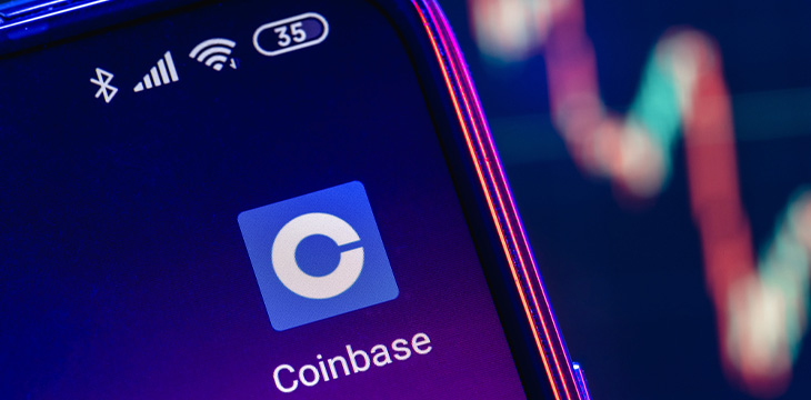 Coinbase app logo on phone