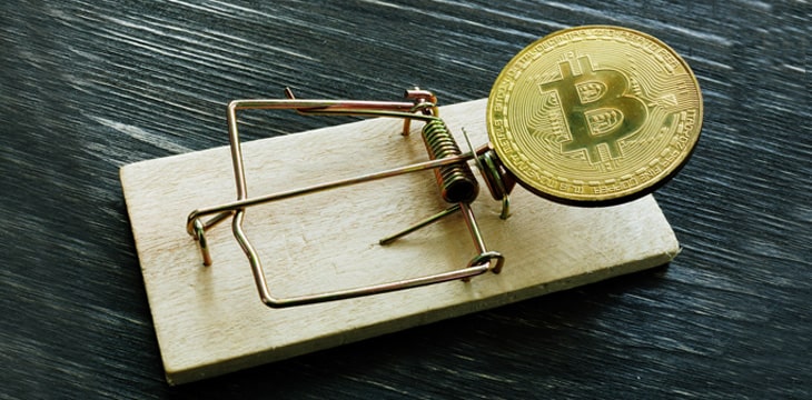 Mousetrap and bitcoin coin in one image
