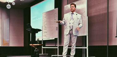 Craig Wright in lecture hall speaking