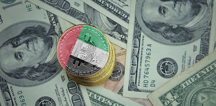 Golden shining bitcoins with flag of united arab emirates on a dollar money background bitcoin mining concept