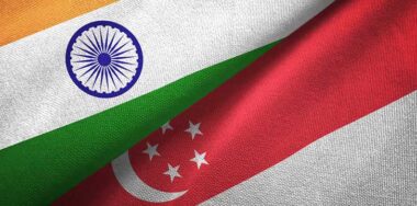 India and Singapore flags together relations textile cloth, fabric texture