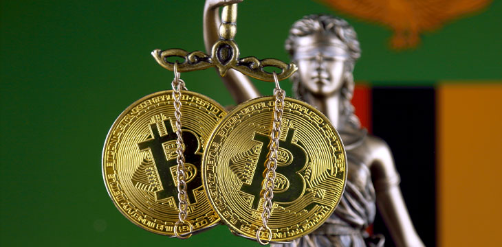 Lady justice holding scale with bitcoins as weights