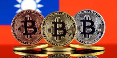 Physical version of Bitcoin (BTC) and Taiwan Conceptual image for investors in High TechnologyFlag
