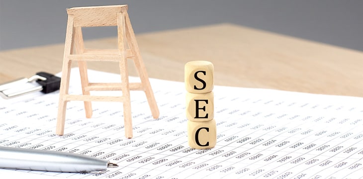 Wooden cubes with the word SEC