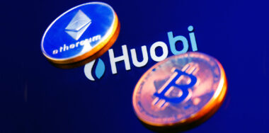 huobi logo with cryptocurrency coins