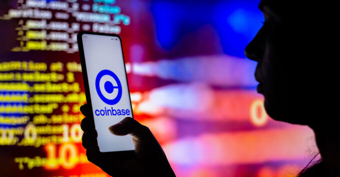 Coinbase logo displayed on a smartphone