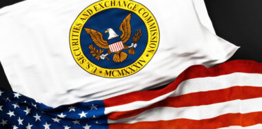 Flag of the United States Securities and Exchange Commission along with a flag of the United States of America as a symbol of a connection between them