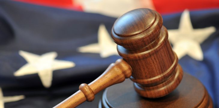 Judicial symbols and America flag on the background
